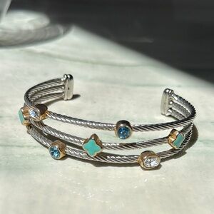 Elegant Silver and Gold-Tone Bracelet with Blue Accents
